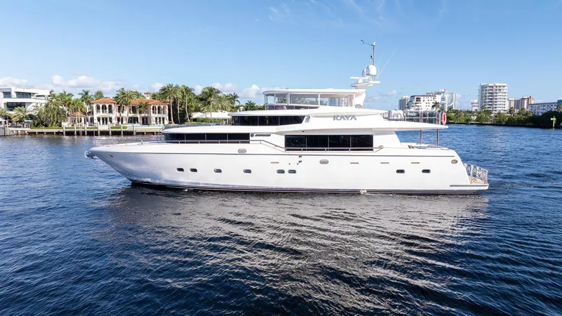 Kaya Yacht Photos Pics Luxurious 2003 Johnson 87 yacht cruising on a sunny day.