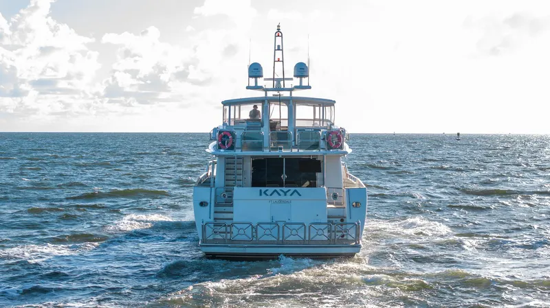 Kaya Yacht Photos Pics Luxury yacht "Kaya" cruising on open sea, Johnson 87 model, 2003.