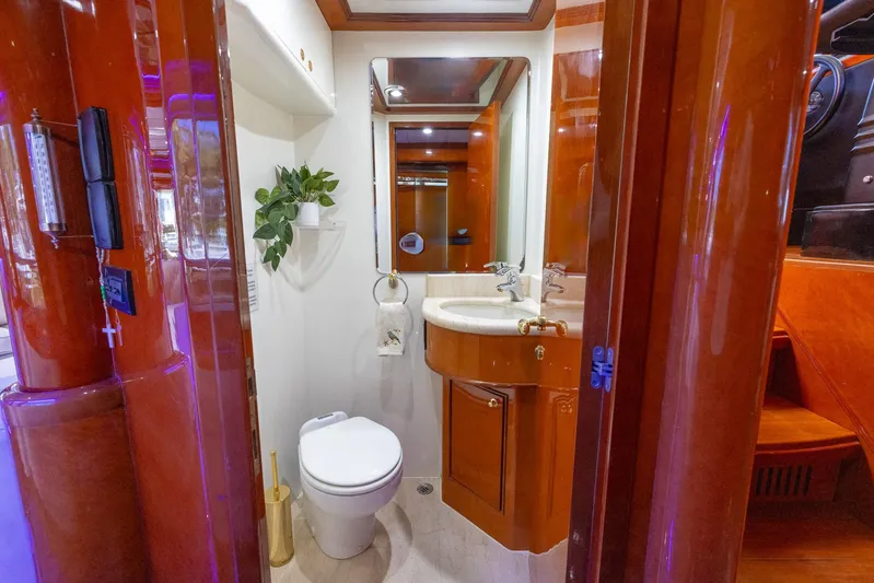 Kaya Yacht Photos Pics Luxurious yacht bathroom with wood accents, Johnson 87 model, 2003.