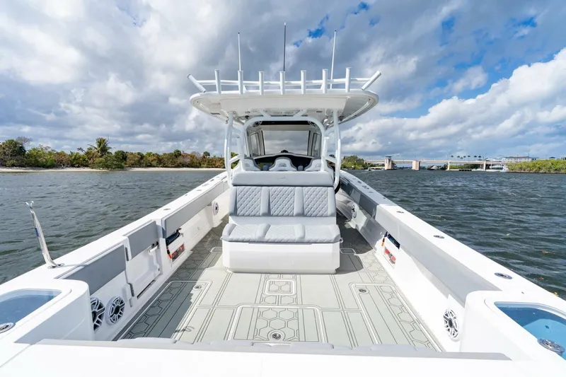 Bramate Yacht Photos Pics 2023 Blackwater High-Performance boat on water, featuring spacious deck and modern design.