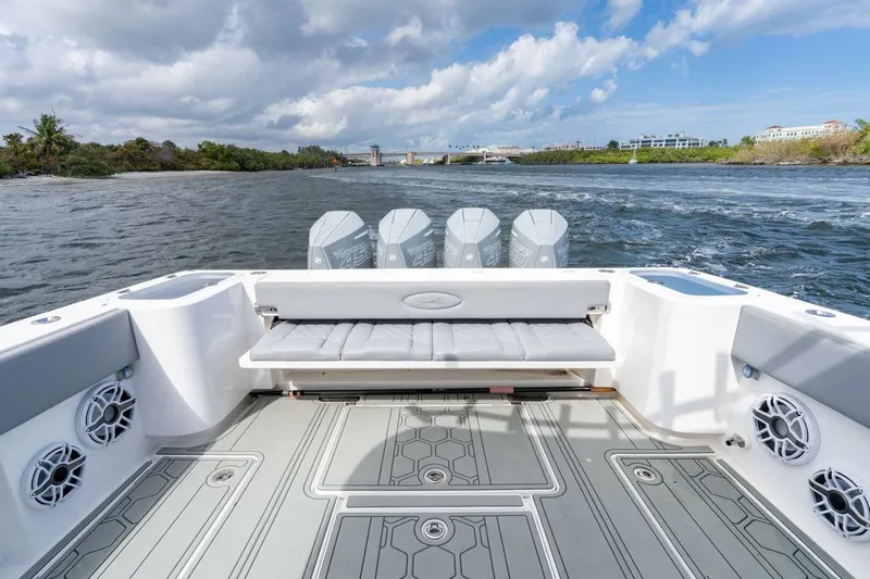 Bramate Yacht Photos Pics 2023 Blackwater High-Performance boat with powerful engines on a scenic waterway.