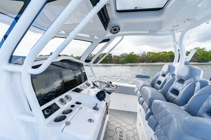 Bramate Yacht Photos Pics 2023 Blackwater High-Performance boat interior with advanced dashboard and luxurious seating.