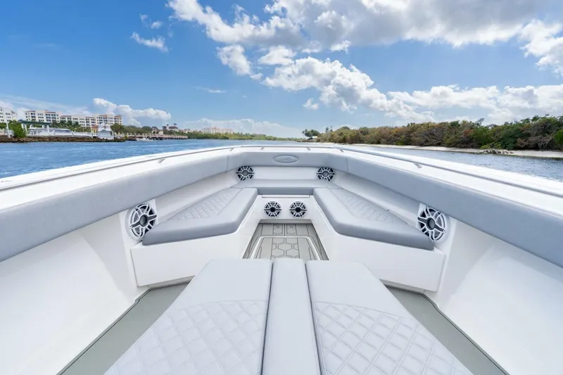 Bramate Yacht Photos Pics Luxurious 2023 Blackwater High-Performance boat interior with sleek seating and scenic water view.