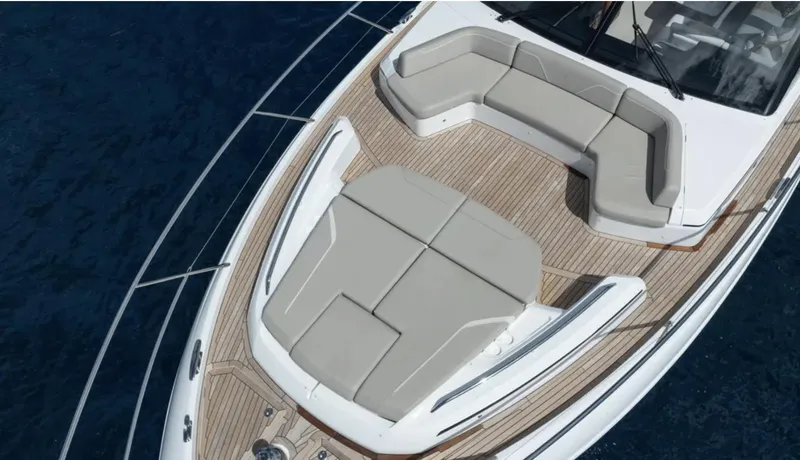  Yacht Photos Pics 2022 Princess S66 yacht deck with luxurious seating and sunbathing area.