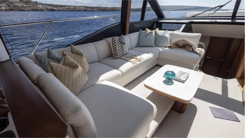  Yacht Photos Pics Luxurious 2022 Princess S66 yacht interior with elegant seating and ocean view.
