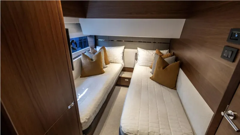  Yacht Photos Pics Luxurious twin cabin interior of 2022 Princess S66 yacht with modern design.