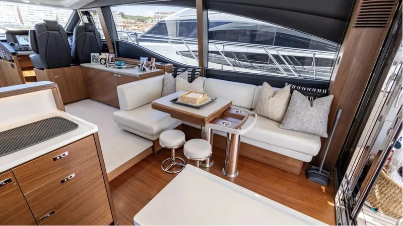  Yacht Photos Pics Luxurious interior of 2022 Princess S66 yacht with elegant seating and modern design.