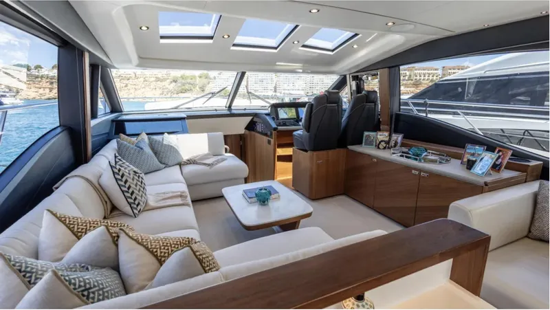  Yacht Photos Pics Luxurious interior of 2022 Princess S66 yacht with elegant seating and modern design.