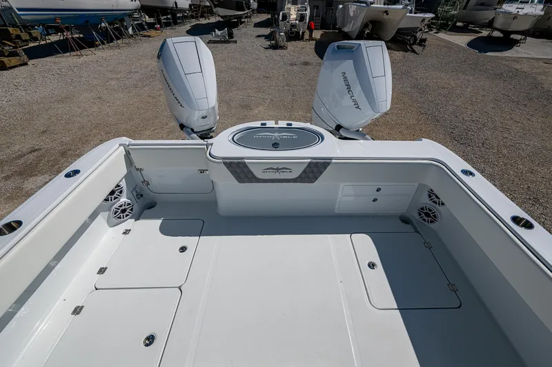  Yacht Photos Pics 2025 Invincible 33 Catamaran with twin outboard motors, spacious deck, and modern design.