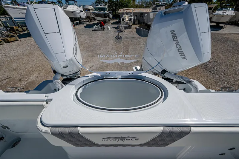  Yacht Photos Pics 2025 Invincible 33 Catamaran with Mercury engines, featuring a sleek design and spacious deck.