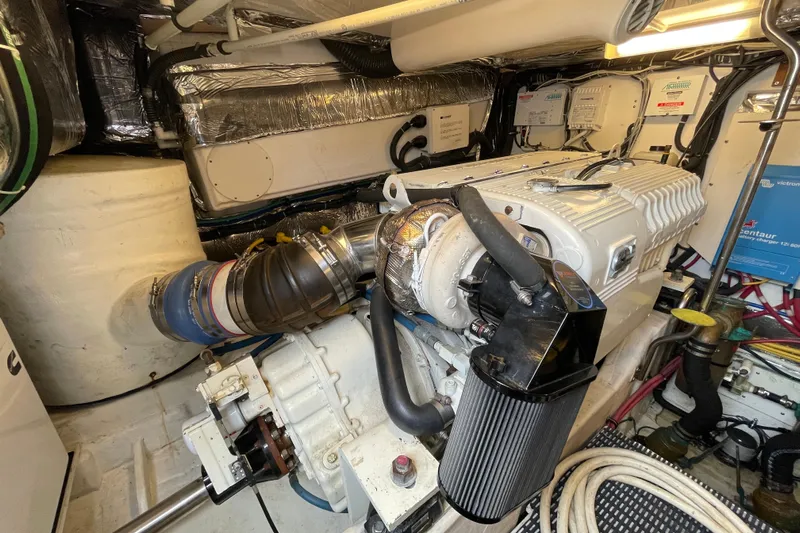Sasea Yacht Photos Pics Engine room of 2009 Tiara Yachts 4200 Open, showcasing detailed mechanical components.