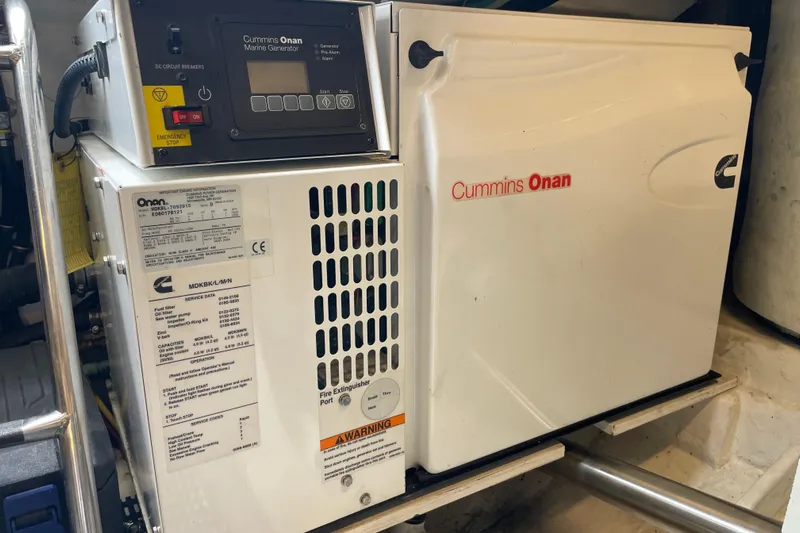 Sasea Yacht Photos Pics Cummins Onan marine generator in 2009 Tiara Yachts 4200 Open engine room.