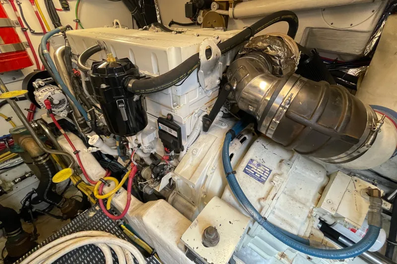 Sasea Yacht Photos Pics Engine room of 2009 Tiara Yachts 4200 Open, showcasing detailed mechanical components.