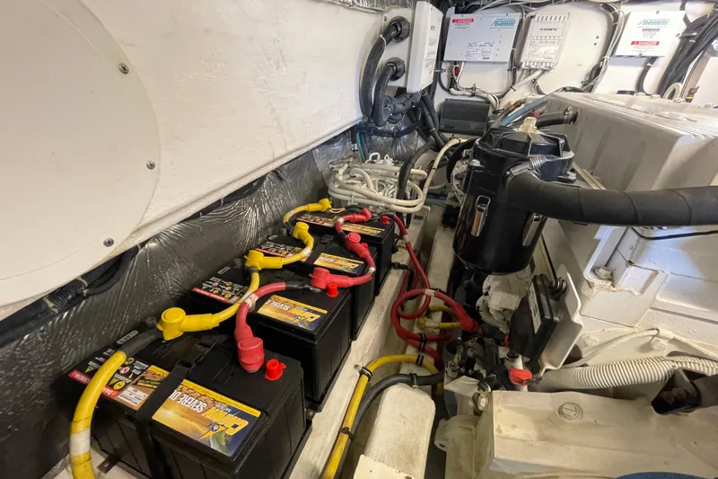 Sasea Yacht Photos Pics Engine room of 2009 Tiara Yachts 4200 Open, featuring batteries and wiring.