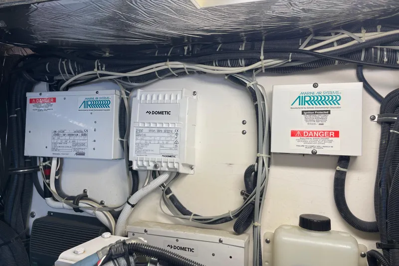 Sasea Yacht Photos Pics Electrical system components in a 2009 Tiara Yachts 4200 Open engine room.