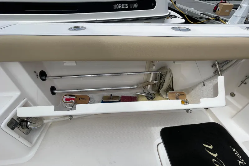 Sasea Yacht Photos Pics 2009 Tiara Yachts 4200 Open interior detail with storage compartment and equipment.