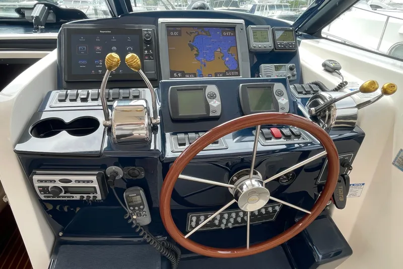 Sasea Yacht Photos Pics 2009 Tiara Yachts 4200 Open helm with advanced navigation and control systems.