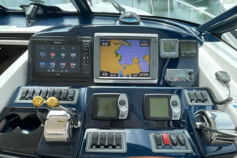 Sasea Yacht Photos Pics Helm of 2009 Tiara Yachts 4200 Open with navigation and control systems.