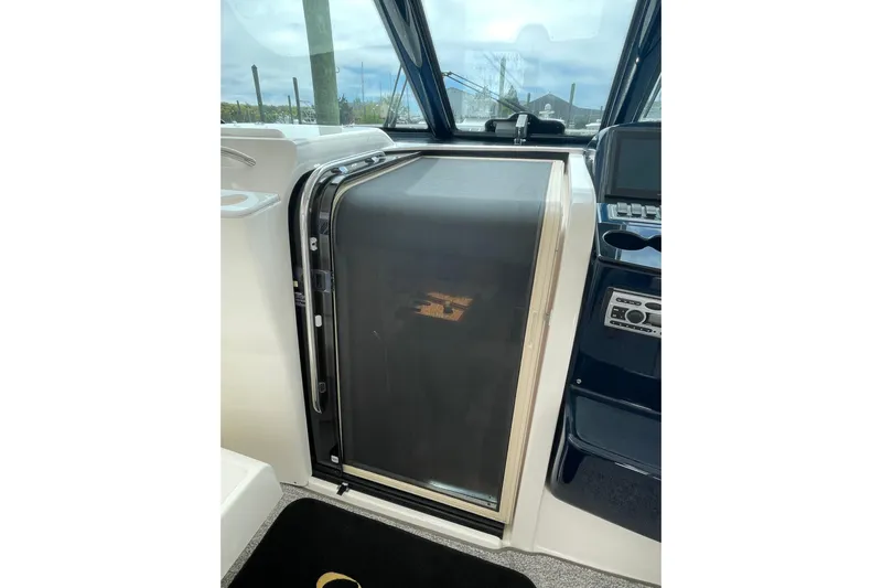 Sasea Yacht Photos Pics 2009 Tiara Yachts 4200 Open cabin door and control panel.