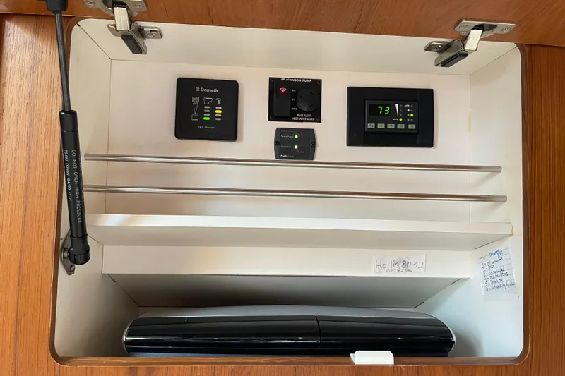 Sasea Yacht Photos Pics Control panel inside 2009 Tiara Yachts 4200 Open, featuring various monitoring systems.