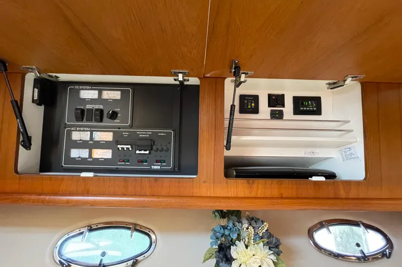 Sasea Yacht Photos Pics Electrical control panel inside 2009 Tiara Yachts 4200 Open, featuring AC and DC systems.