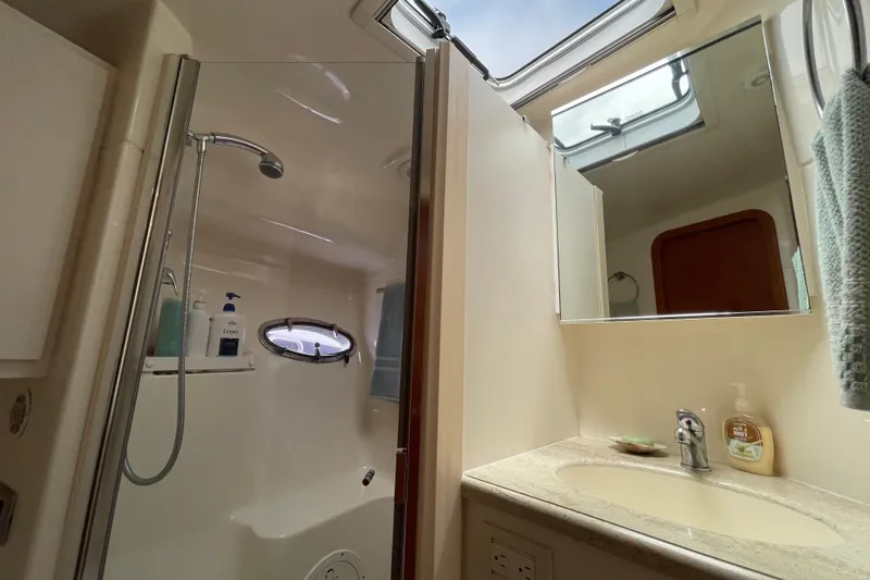 Sasea Yacht Photos Pics Bathroom interior of 2009 Tiara Yachts 4200 Open, featuring shower and sink.