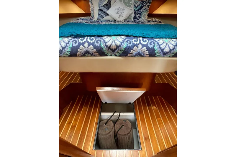 Sasea Yacht Photos Pics Tiara Yachts 4200 Open 2009 interior with open floor storage compartment.