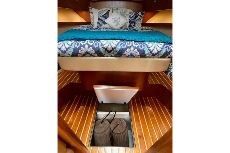 Sasea Yacht Photos Pics 2009 Tiara Yachts 4200 Open cabin with bed and open floor hatch.