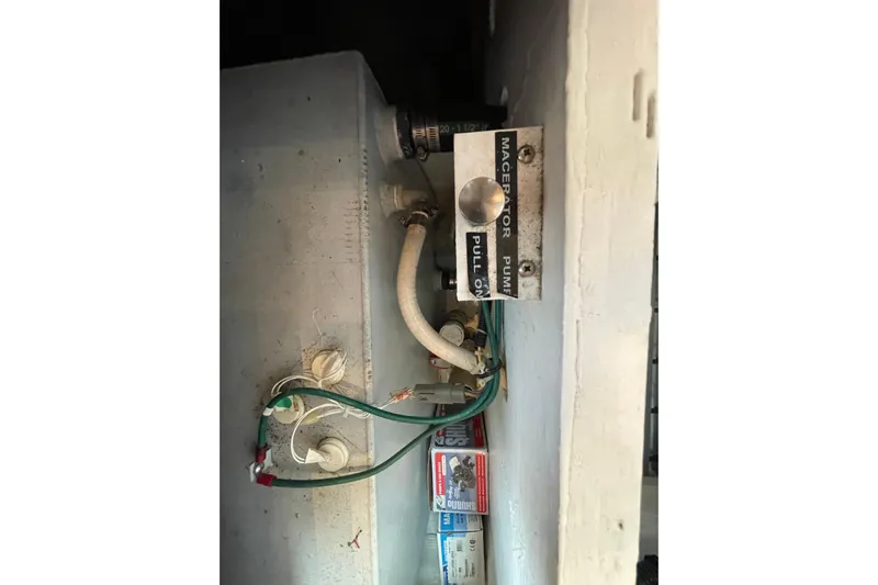 Sasea Yacht Photos Pics Macerator pump system in 2009 Tiara Yachts 4200 Open, featuring hoses and wiring.