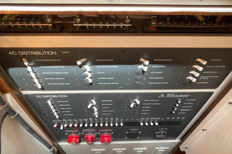 Sasea Yacht Photos Pics Control panel of a 2009 Tiara Yachts 4200 Open, featuring AC and DC distribution switches.