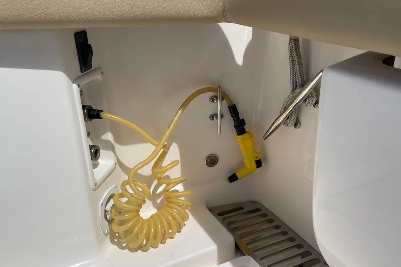 Sasea Yacht Photos Pics 2009 Tiara Yachts 4200 Open deck detail with coiled hose and cleat.