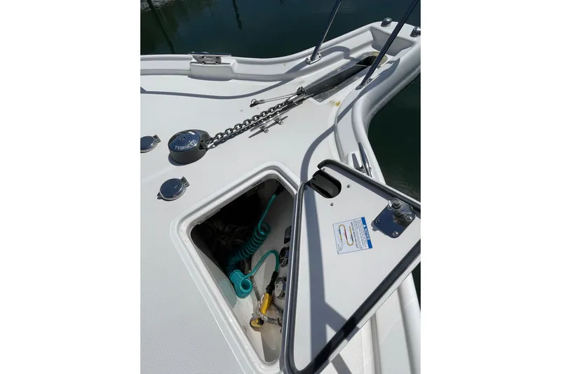 Sasea Yacht Photos Pics 2009 Tiara Yachts 4200 Open anchor locker with chain and storage compartment.