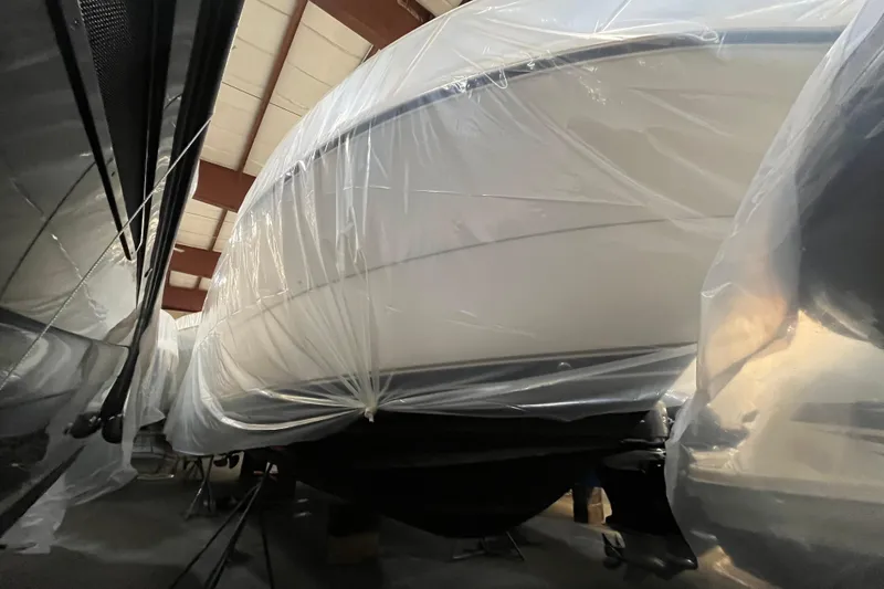 Sasea Yacht Photos Pics 2009 Tiara Yachts 4200 Open wrapped in protective plastic in storage facility.