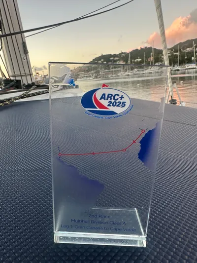 Ampedup Yacht Photos Pics ARC+ 2025 trophy on Fountaine Pajot Aura 51 catamaran.