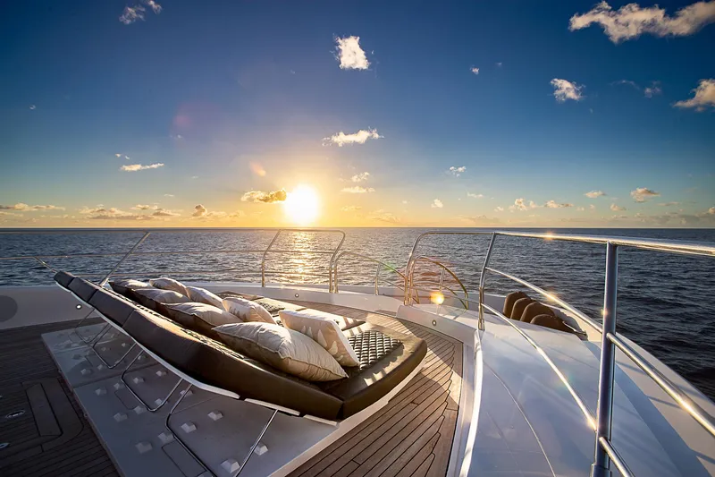 Evereast Yacht Photos Pics Sunseeker Predator 115 yacht deck at sunset, 2013 model.