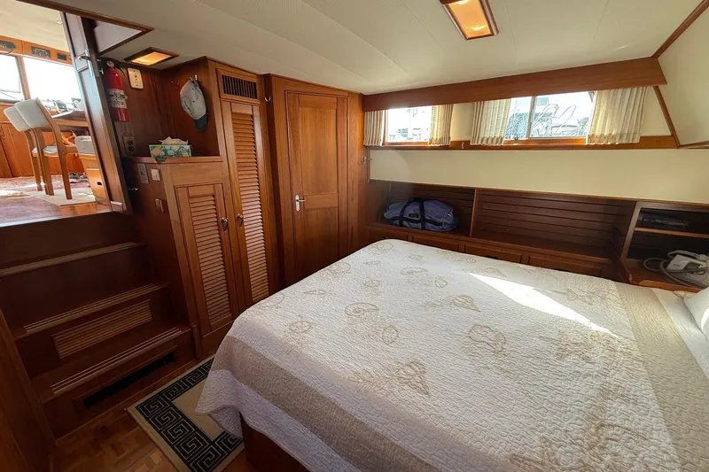 Margo Yacht Photos Pics Cozy cabin interior of 1996 Grand Banks 42 Classic yacht with wooden furnishings.