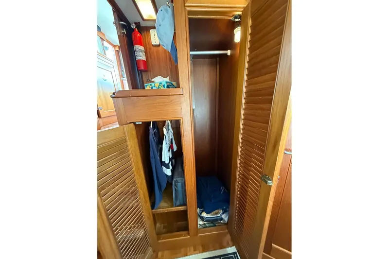 Margo Yacht Photos Pics Wooden closet interior on a 1996 Grand Banks 42 Classic boat.