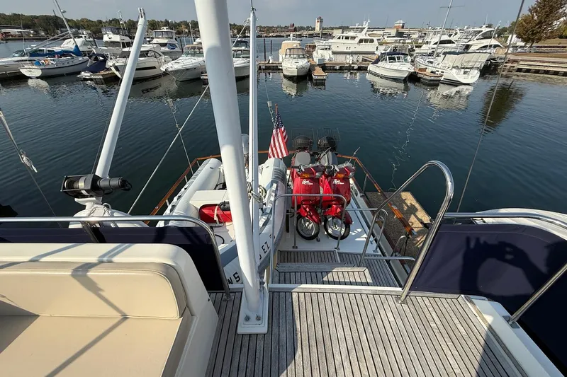 Margo Yacht Photos Pics Grand Banks 42 Classic yacht, 1996 model, docked with scooters on deck.