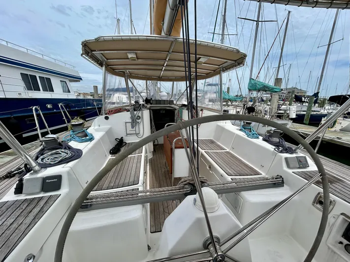 Blue Moon Yacht Photos Pics Cockpit view of 2003 Beneteau First 47.7 sailboat docked at marina.