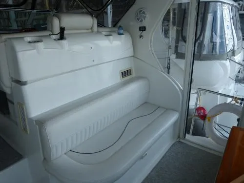  Yacht Photos Pics 2001 Cruisers Yachts 4450 Express Motoryacht interior with white seating and modern design.