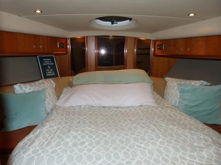 Yacht Photos Pics Luxurious bedroom interior of 2001 Cruisers Yachts 4450 Express Motoryacht.