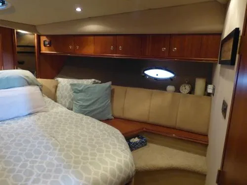  Yacht Photos Pics Luxurious bedroom interior of 2001 Cruisers Yachts 4450 Express Motoryacht.