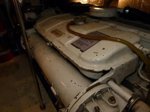  Yacht Photos Pics Engine compartment of 2001 Cruisers Yachts 4450 Express Motoryacht, showcasing mechanical components.