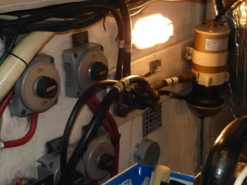  Yacht Photos Pics Engine room of 2001 Cruisers Yachts 4450 Express Motoryacht with switches and wiring.