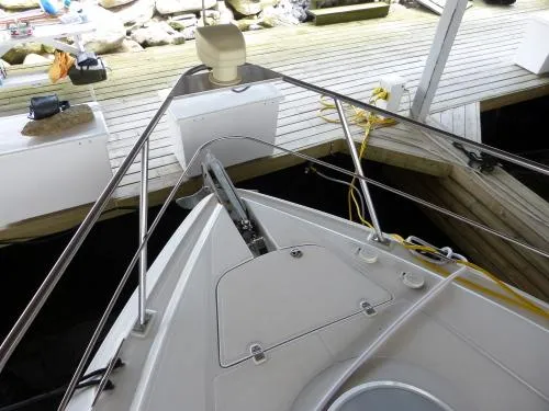  Yacht Photos Pics Bow view of 2001 Cruisers Yachts 4450 Express Motoryacht docked at marina.