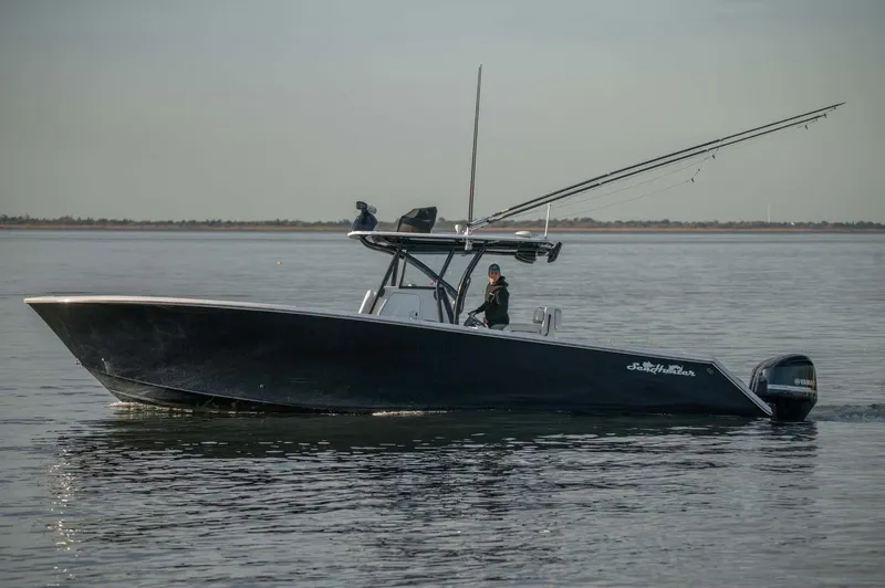Mr Fish Yacht Photos Pics 2016 SeaHunter 35 Tournament boat cruising on calm waters.