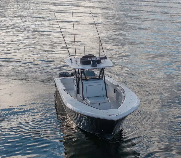 Mr Fish Yacht Photos Pics 2016 SeaHunter 35 Tournament boat on calm water, equipped for fishing.