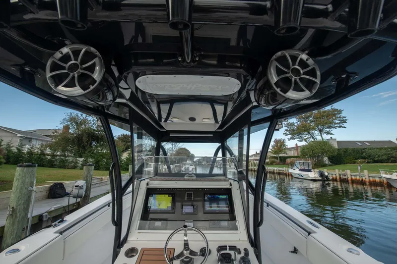 Mr Fish Yacht Photos Pics 2016 SeaHunter 35 Tournament boat cockpit with advanced navigation system and speakers.