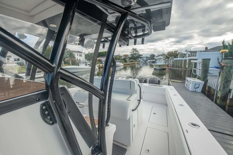 Mr Fish Yacht Photos Pics 2016 SeaHunter 35 Tournament boat docked, showcasing spacious deck and sleek design.