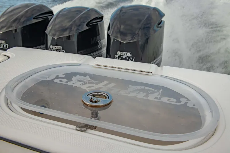 Mr Fish Yacht Photos Pics SeaHunter 35 Tournament 2016 boat with Yamaha engines, rear view on water.